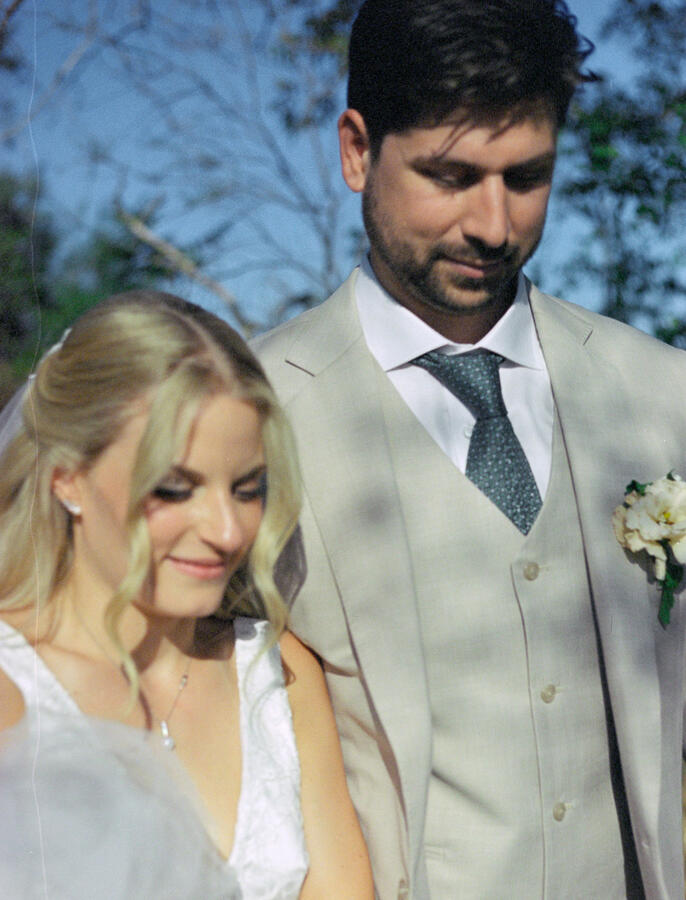 married couple walking on wedding